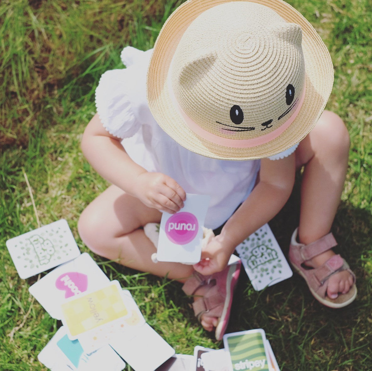 little girl enjoys playing gofindit